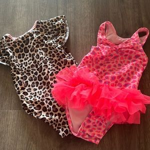 Two one piece bathing suits